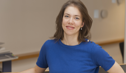 Female guest lecturer in front of podium