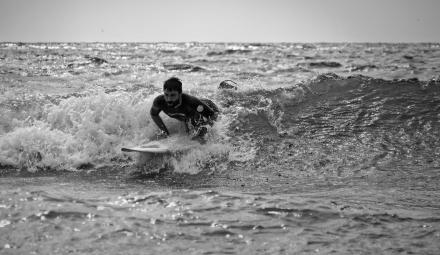 Alessio Buccino from the Summer School tests the waters of San Diego. Photo: Christopher Villongco, UCSD Alessio Buccino from the Summer School tests the waters of San Diego. Photo: Christopher Villongco, UCSD