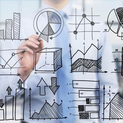 Quantitative analyst is drawing different charts on a glass screen. Photo by: ImageFlow. Source: shutterstock.com